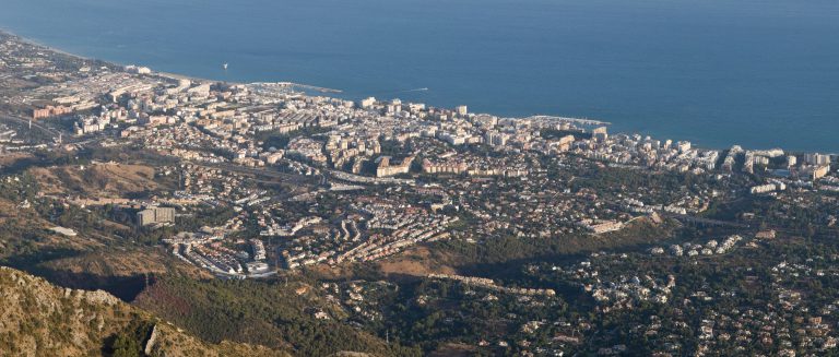 'Marbella seen from the slopes of La Concha, the city spreading along the coast to the sea'