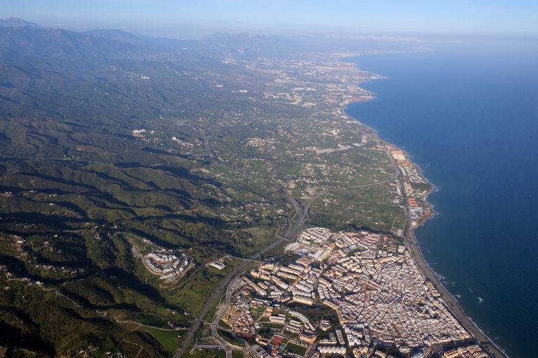 'Aerial view looking east from Estepona along the coast towards San Pedro Alcántara and Marbella'
